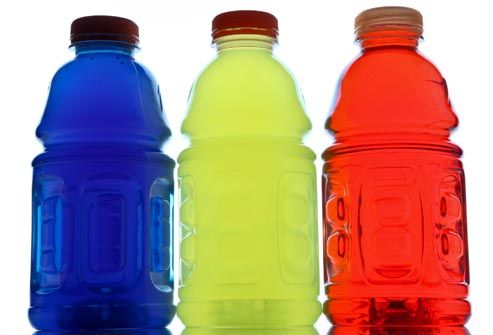 Three Sugary sports drinks bottles