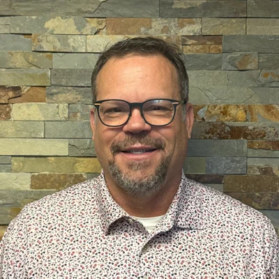 A headshot photo of Dr. Benedict Vanek