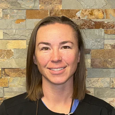 A headshot photo of dental hygienist Kristy