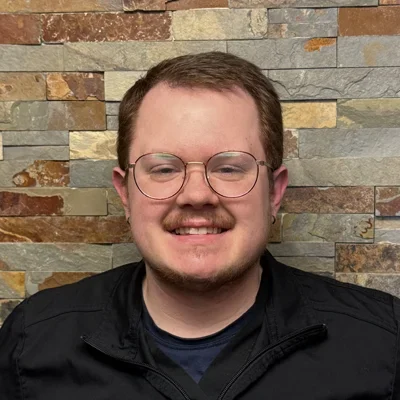 A headshot photo of dental hygienist Landon