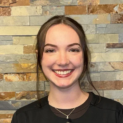 A headshot photo of dental assistant Madison