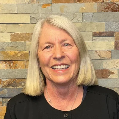 A headshot photo of dental hygienist Marie